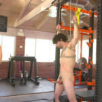 Bound gym whore gets the cum fucked right out of his uncut cock